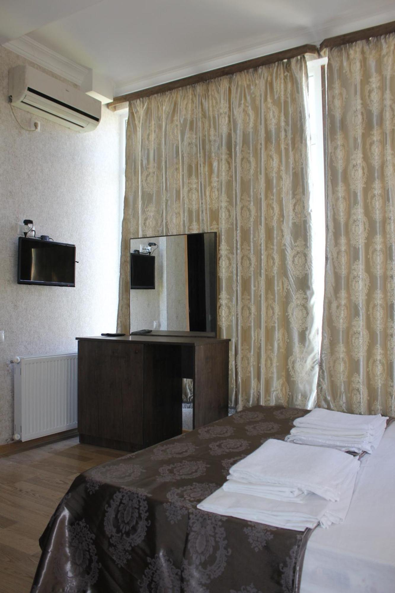 Hotel Mimino Tbilisi Quarto foto